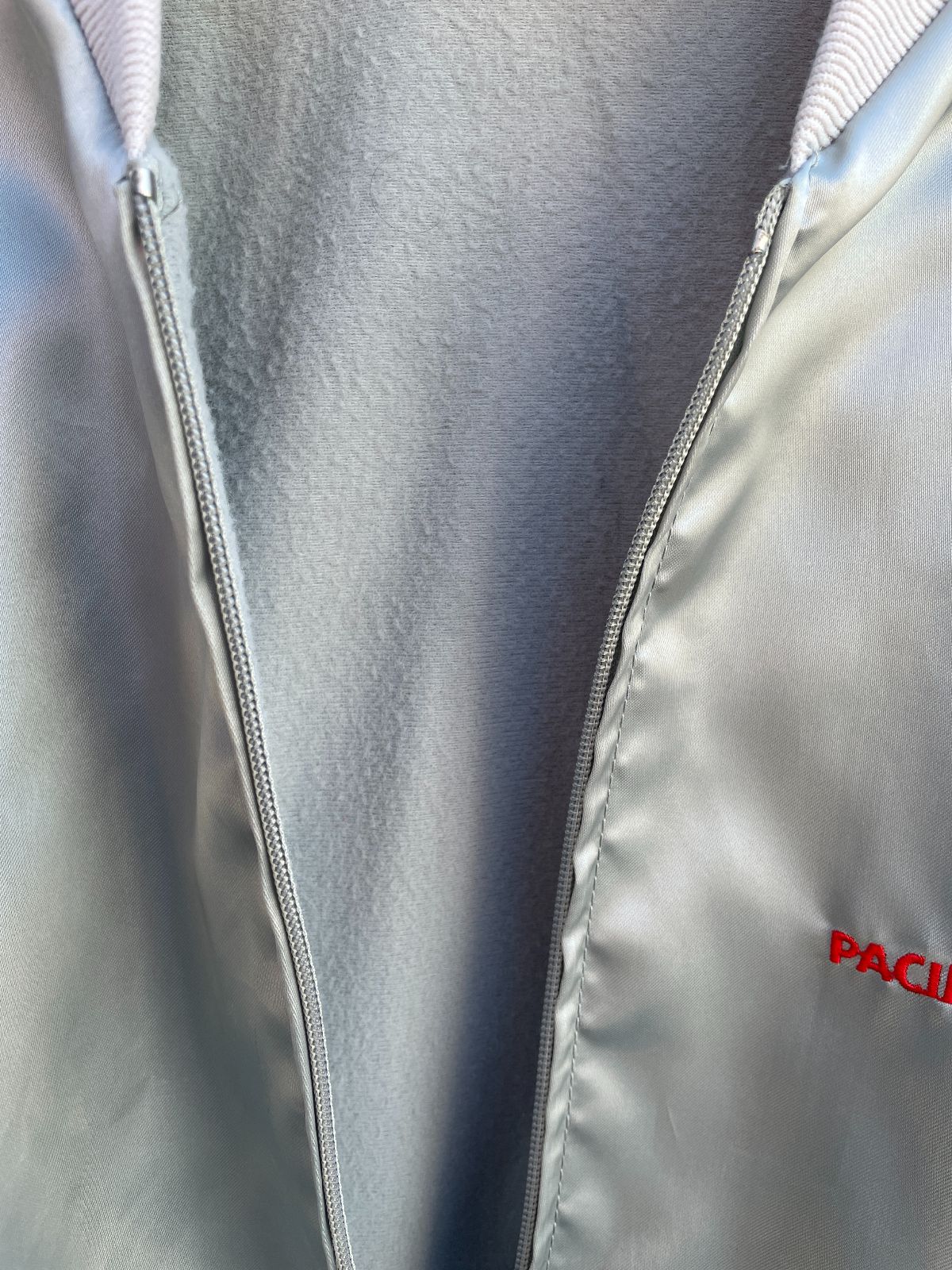 HORIZON EMBROIDERED PACIFIC BELL SILVER ZIPUP JACKET W/ RED PIPING in SILVER, RED