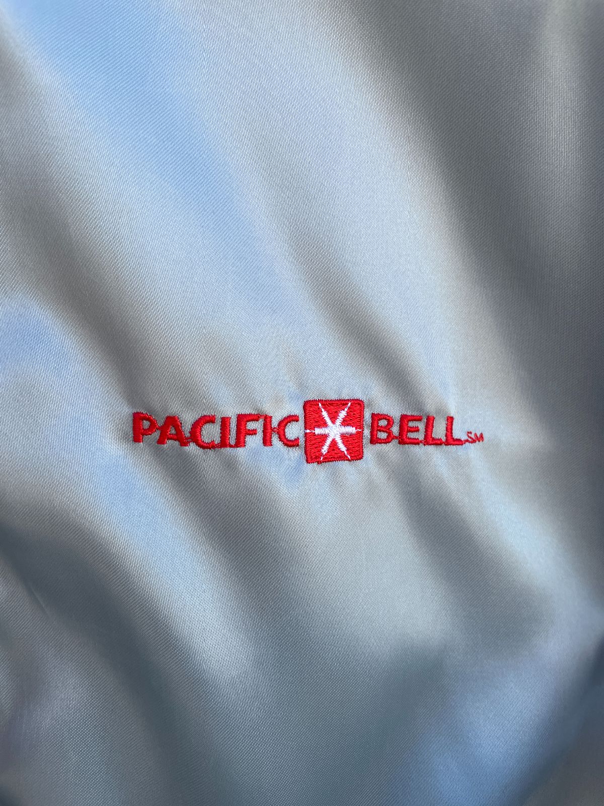 HORIZON EMBROIDERED PACIFIC BELL SILVER ZIPUP JACKET W/ RED PIPING in SILVER, RED