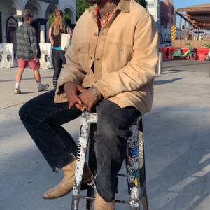 CARHARTT PERFECTLY THRASHED CARHARTT CHORE JACKET W/ RED INNER LINING in TAN