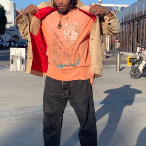 CARHARTT PERFECTLY THRASHED CARHARTT CHORE JACKET W/ RED INNER LINING in TAN