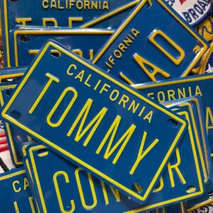ASSORTED CALIFORNIA LICENSE PLATE NAME PLATES in BLUE, YELLOW