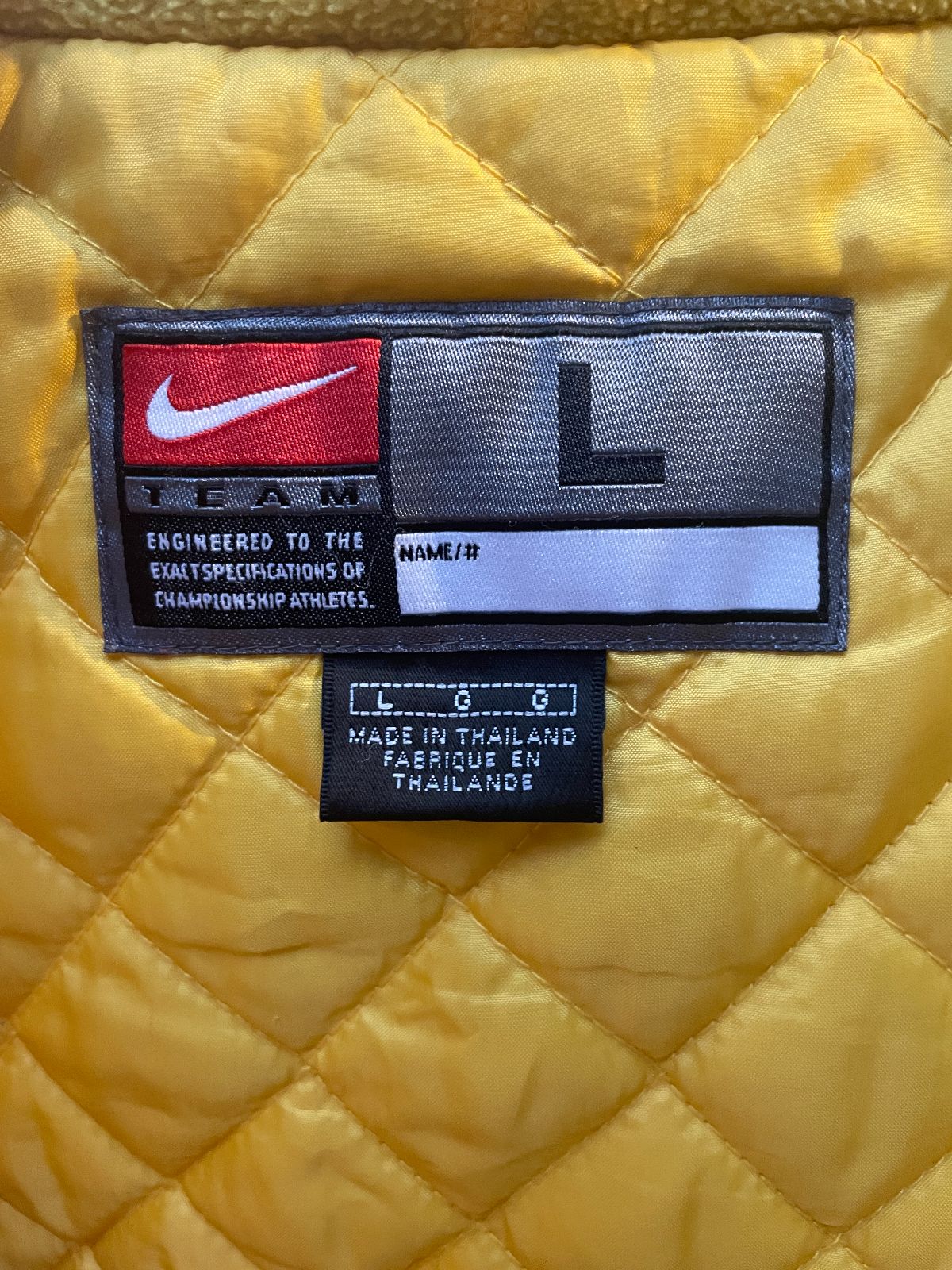 NIKE 1990S | Y2K UNIVERSITY OF MICHIGAN ZIP FRONT NYLON INSULATED PARKA JACKET WITH HOOD in NAVY BLUE, YELLOW