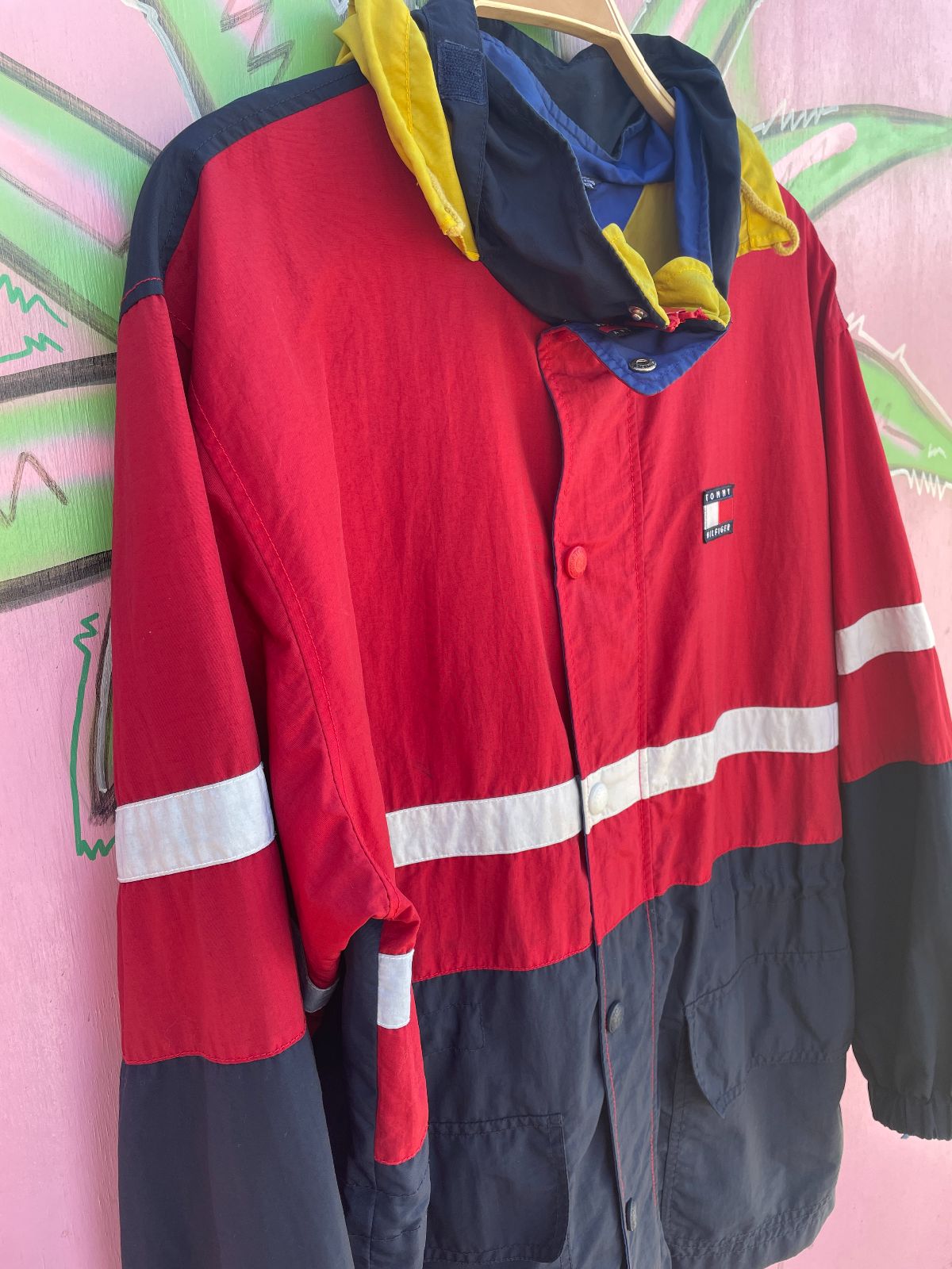 TOMMY HILFIGER TOMMY HILFIGER COLORBLOCK SAILING JACKET W/ HIDEAWAY HOOD in RED, BLUE, YELLOW