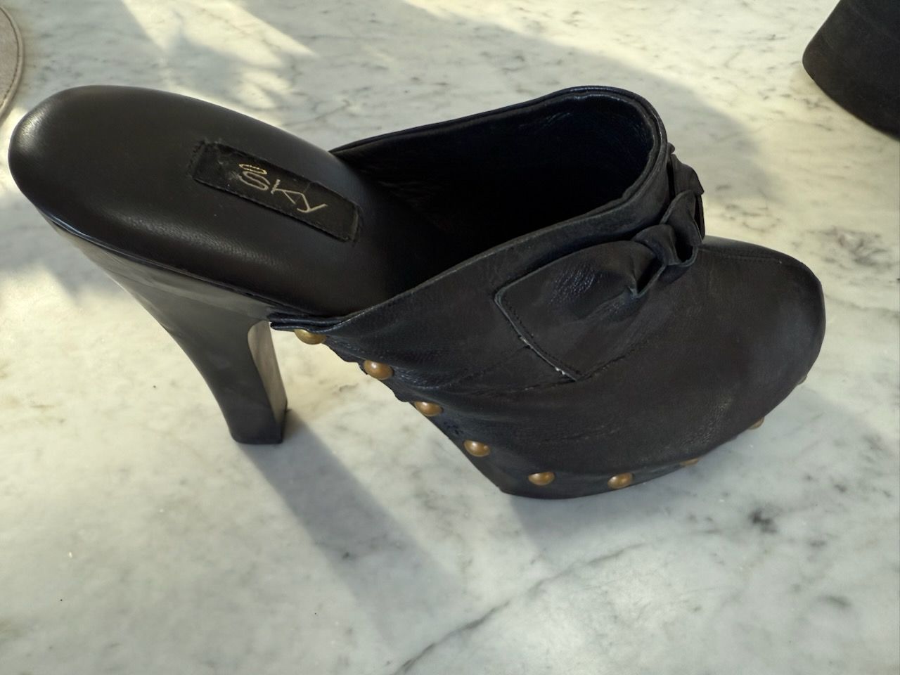 SKY Y2K BRASS STUDDED RUCHED LEATHER STACKED HEEL MULES in BLACK, GOLD