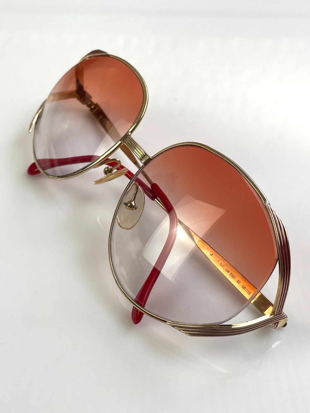 CHRISTIAN DIOR GORGEOUS! 1970S DIOR GOLD BUTTERFLY FRAME CUSTOM GRADIENT LENSE in GOLD, RED, AMBER