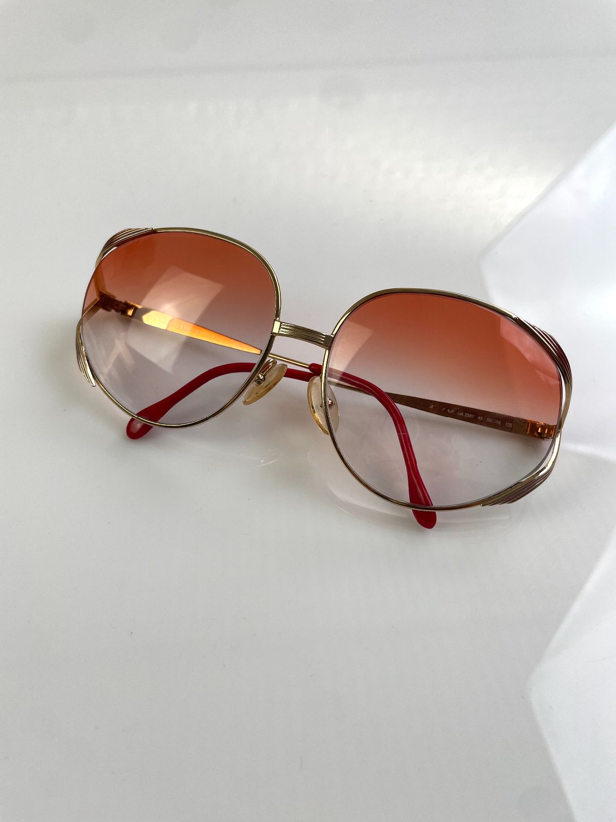 CHRISTIAN DIOR GORGEOUS! 1970S DIOR GOLD BUTTERFLY FRAME CUSTOM GRADIENT LENSE in GOLD, RED, AMBER