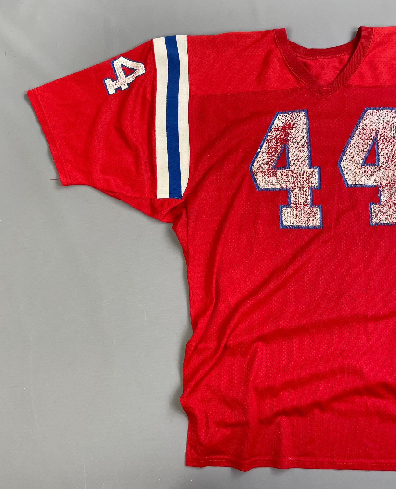 MACGREGOR PERFECTLY DISTRESSED AUTHENTIC 80'S JOHN STEPHENS NEW ENGLAND PATRIOTS SAND-KNIT #44 FOOTBALL JERSEY in RED, BLUE, WHITE