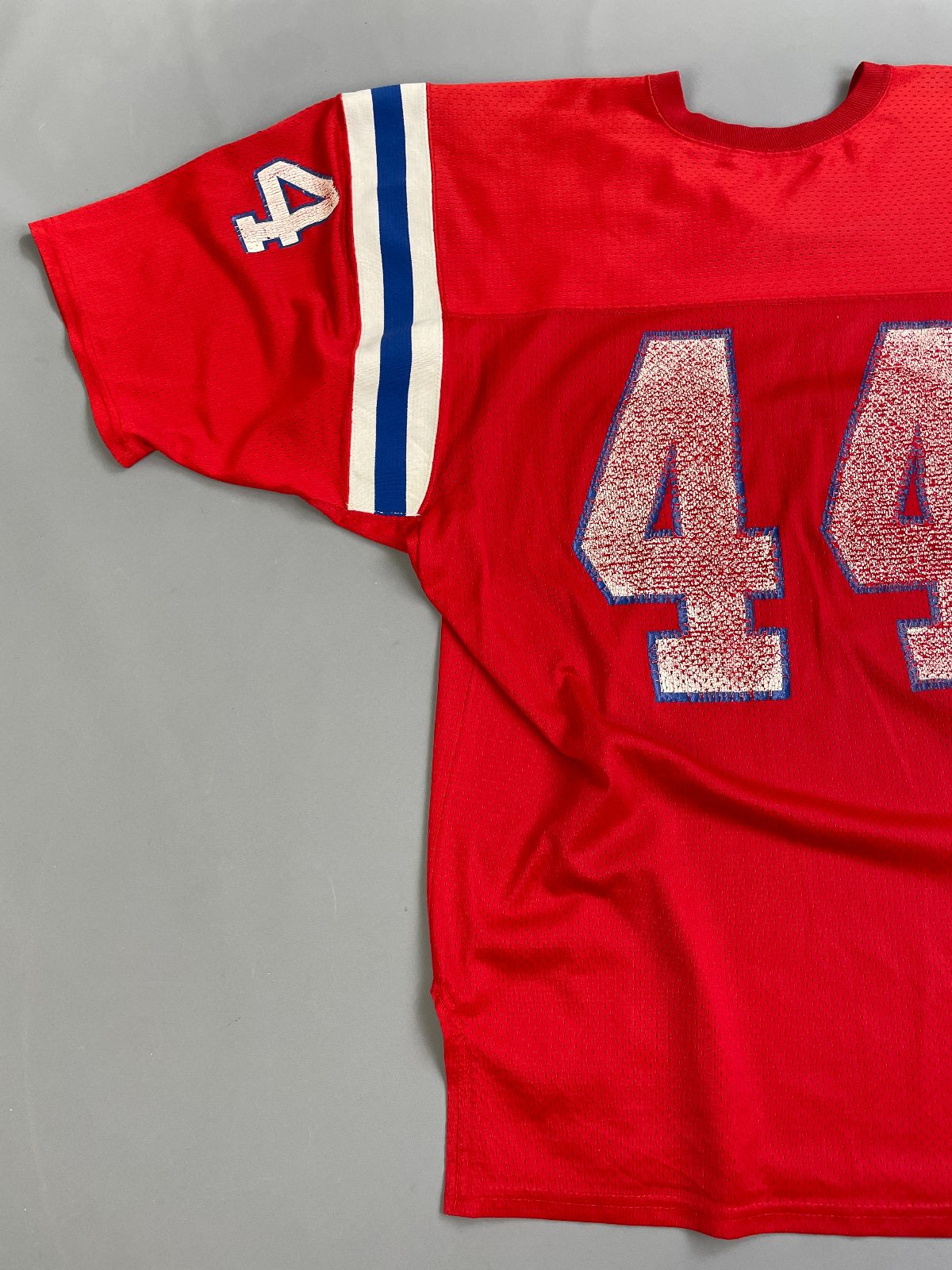 MACGREGOR PERFECTLY DISTRESSED AUTHENTIC 80'S JOHN STEPHENS NEW ENGLAND PATRIOTS SAND-KNIT #44 FOOTBALL JERSEY in RED, BLUE, WHITE