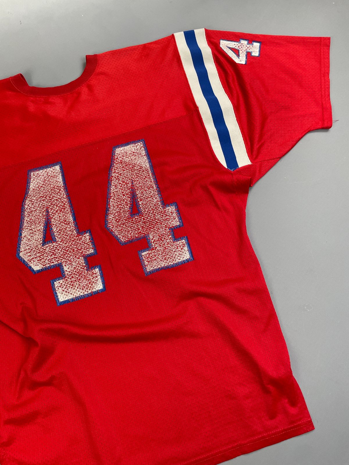 MACGREGOR PERFECTLY DISTRESSED AUTHENTIC 80'S JOHN STEPHENS NEW ENGLAND PATRIOTS SAND-KNIT #44 FOOTBALL JERSEY in RED, BLUE, WHITE