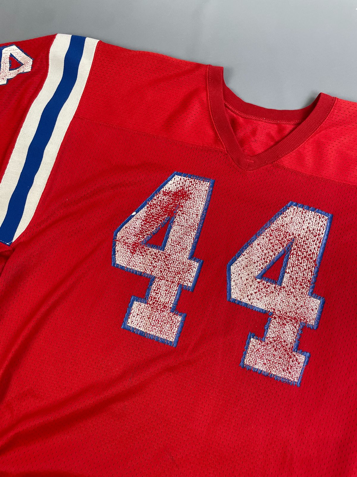 MACGREGOR PERFECTLY DISTRESSED AUTHENTIC 80'S JOHN STEPHENS NEW ENGLAND PATRIOTS SAND-KNIT #44 FOOTBALL JERSEY in RED, BLUE, WHITE