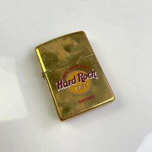 ZIPPO *AS-IS* 1990S HARD ROCK CAFE CHICAGO - SAVE THE PLANET BRASS ZIPPO LIGHTER, MADE IN USA in GOLD