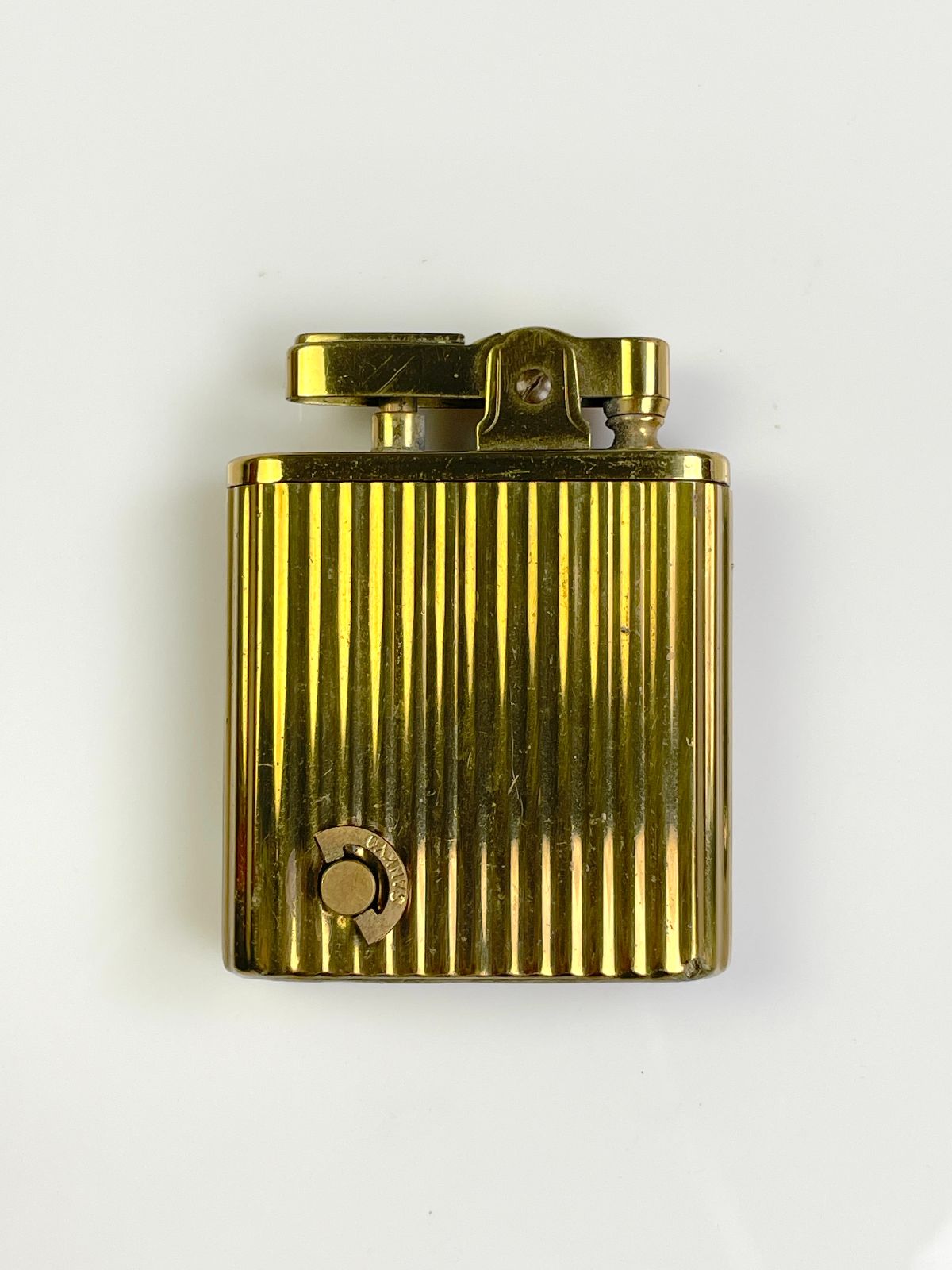 SO COOL! 1960S RIBBED BRASS REFILLABLE LIGHTER MUSICAL LIGHTER WINDUP MUSIC MECHANISM in GOLD