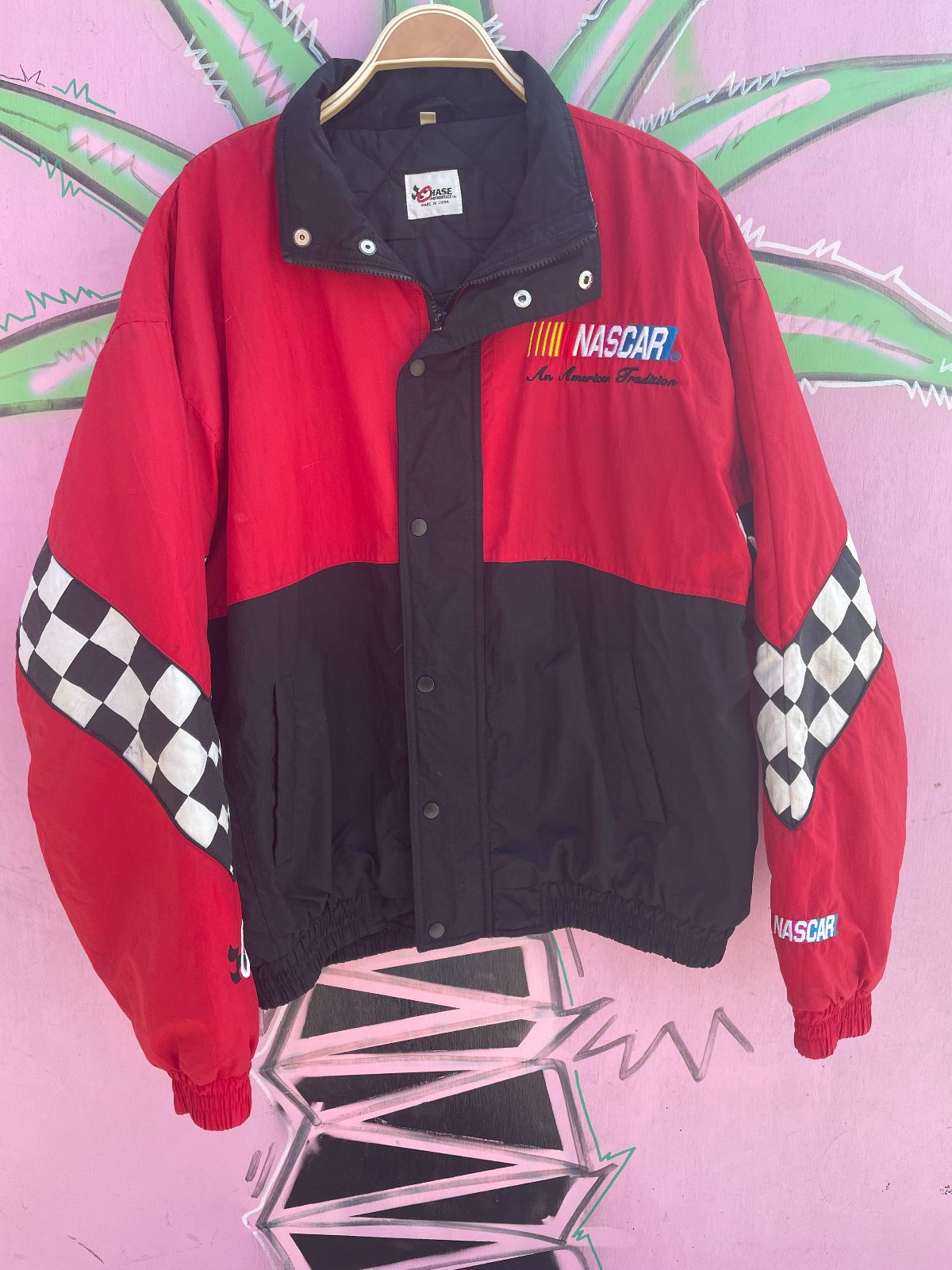 CHASE AUTHENTICS NASCAR RACING EMBROIDERED COLORBLOCK PUFFY JACKET W/ CHECKERED SLEEVES in RED, BLACK