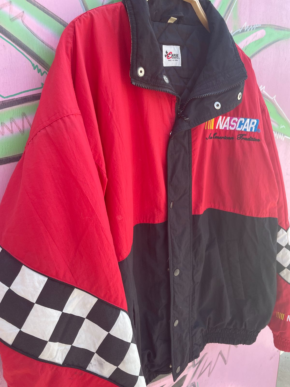 CHASE AUTHENTICS NASCAR RACING EMBROIDERED COLORBLOCK PUFFY JACKET W/ CHECKERED SLEEVES in RED, BLACK