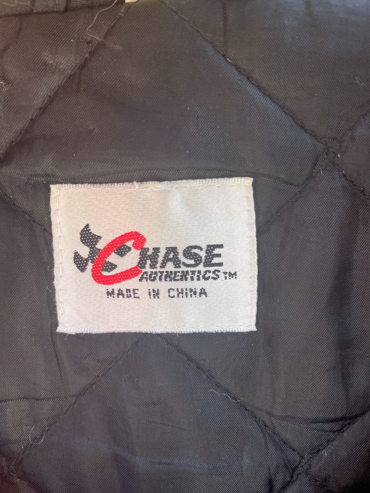 CHASE AUTHENTICS NASCAR RACING EMBROIDERED COLORBLOCK PUFFY JACKET W/ CHECKERED SLEEVES in RED, BLACK