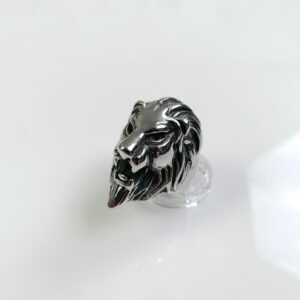 LIONS HEAD RING HIGH POLISHED BLACKENED STAINLESS STEEL, JEWEL EYES in SILVER, RED