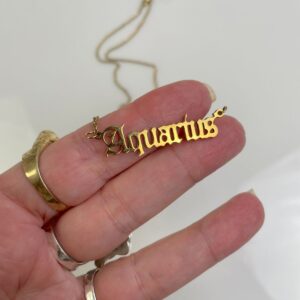 AQUARIUS OLD ENGLISH LETTERING PLAQUE NECKLACE in GOLD