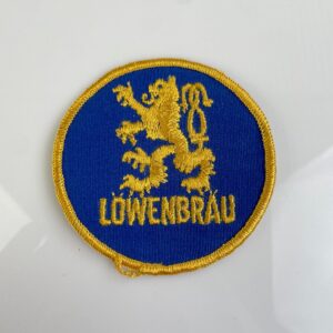 1970S LOWENBRAU BEER LION CREST EMBROIDERED SEW-ON PATCH, MESH BACKING *DEADSTOCK in BLUE, GOLD
