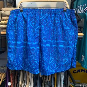 BUGLE BOY SPORT 1990S TONAL TIKI PRINT NYLON ELASTIC WAIST SWIM SHORTS W/ MESH INNER LINING in BLUE