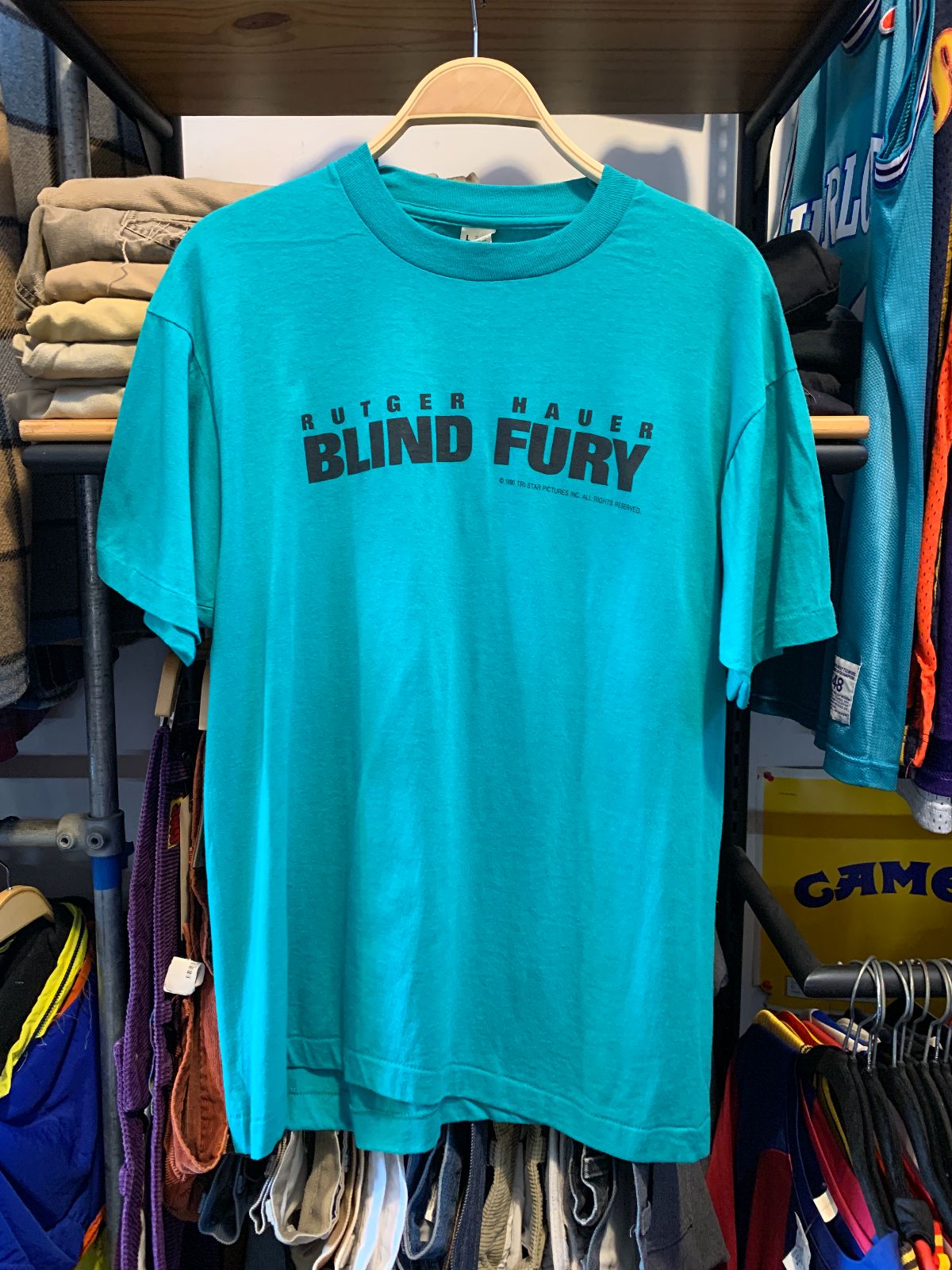 SCREEN STARS 1990 DEADSTOCK RUTGER HAUER BLIND FURY LOGO GRAPHIC SINGLE STITCH T-SHIRT in GREEN