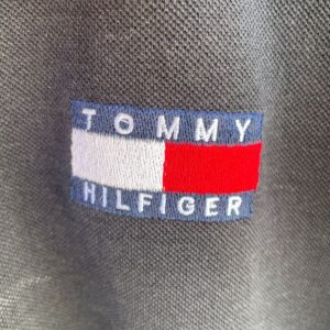 TOMMY HILFIGER TOMMY HILFIGER BLACK POLO SHIRT WITH LOGO PATCH in BLACK, RED, WHITE, BLUE