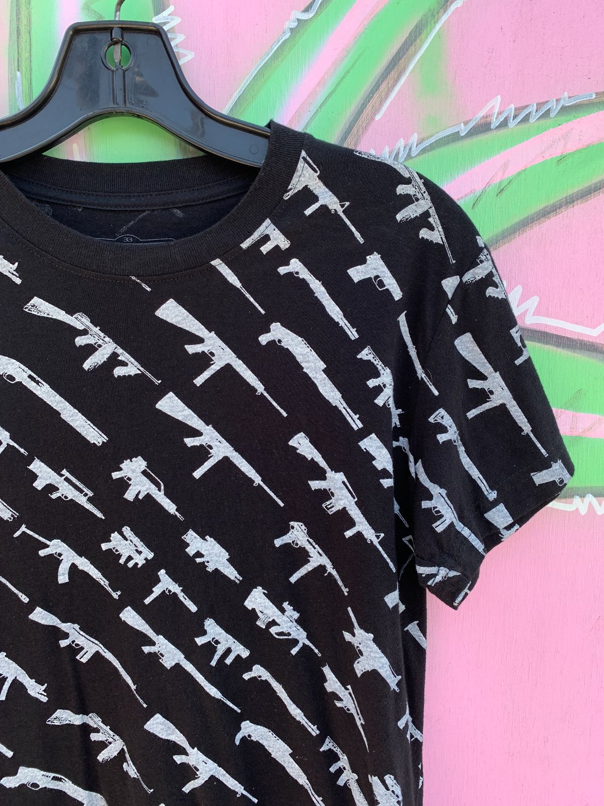 ROGUE STATUS Y2K ROGUE STATUS ALL OVER GUN PRINT T SHIRT in BLACK, WHITE