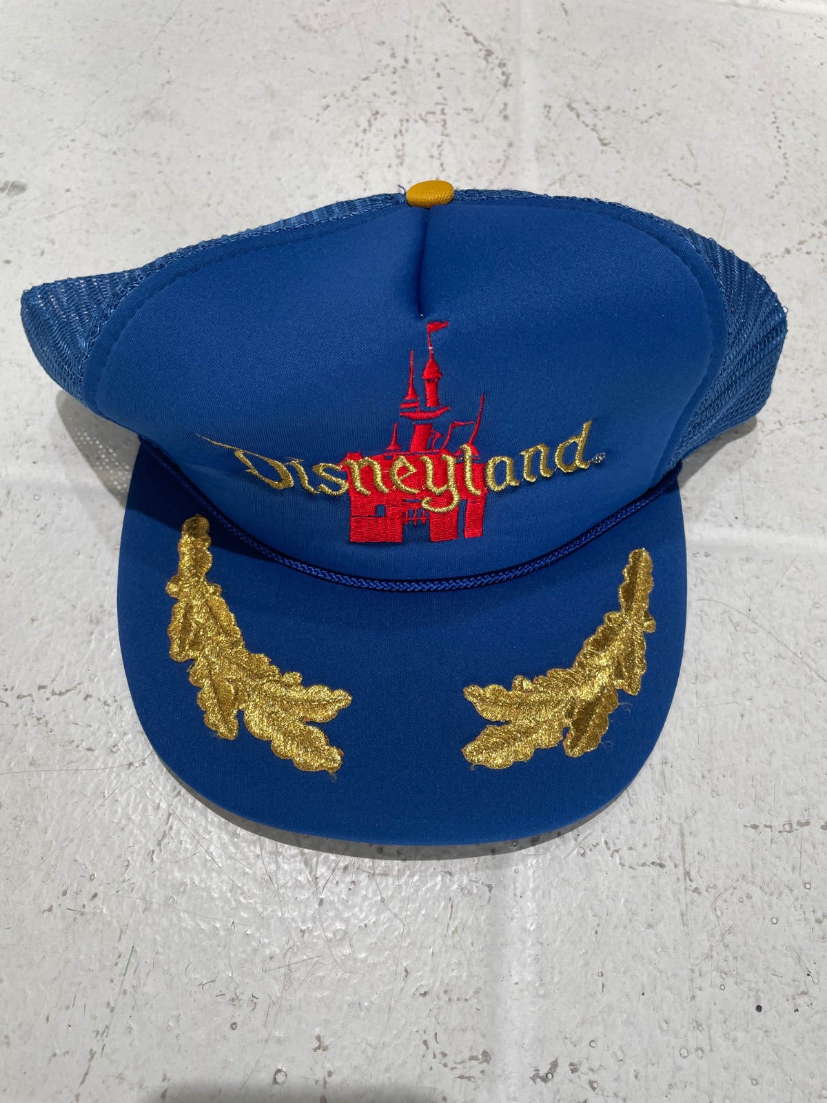 DISNEYLAND BLUE TRUCKER HAT WITH GOLD LEAF EMBROIDERY in BLUE, RED, GOLD