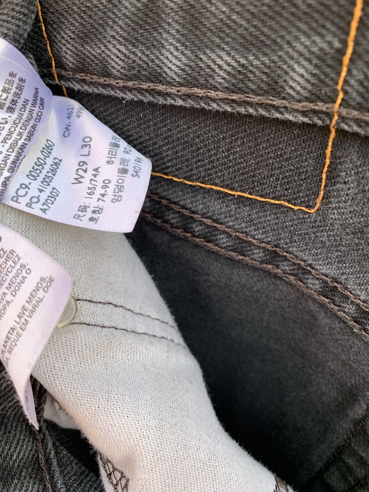 LEVIS AS-IS PERFECT FADE WITH LIGHT DISTRESS HEMMED LEVIS 550 STRAIGHT LEG 29X26 in BLACK