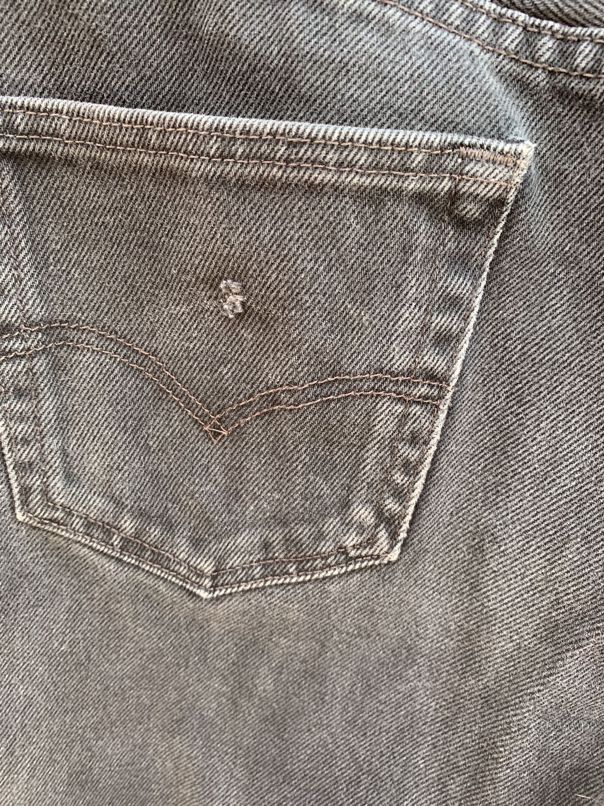 LEVIS AS-IS PERFECT FADE WITH LIGHT DISTRESS HEMMED LEVIS 550 STRAIGHT LEG 29X26 in BLACK