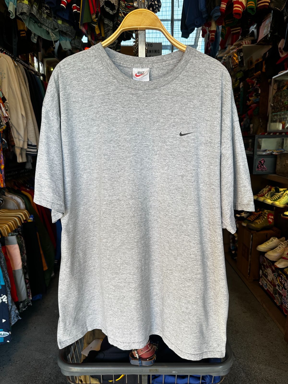 NIKE 1990S | EARLY Y2K OVERSIZED NIKE MADE IN MEXICO T-SHIRT WITH SMALL SWOOSH LOGO, LARGE BACK GRAPHIC in GRAY