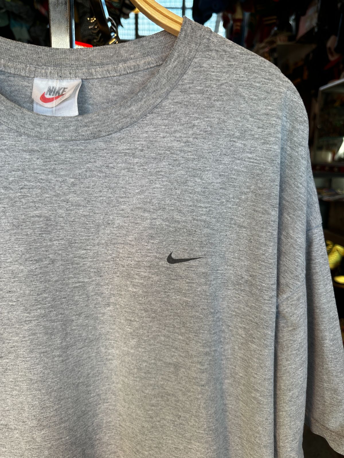 NIKE 1990S | EARLY Y2K OVERSIZED NIKE MADE IN MEXICO T-SHIRT WITH SMALL SWOOSH LOGO, LARGE BACK GRAPHIC in GRAY