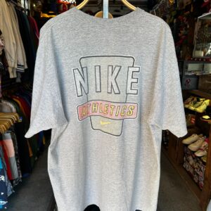 NIKE 1990S | EARLY Y2K OVERSIZED NIKE MADE IN MEXICO T-SHIRT WITH SMALL SWOOSH LOGO, LARGE BACK GRAPHIC in GRAY