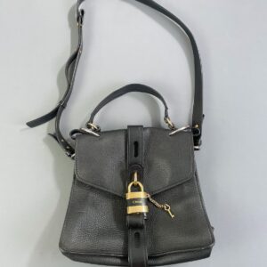 CHLOE ABY DAY PEBBLED LEATHER CROSSBODY BAG WITH PADDINGTON STYLE LOCK CLASSIC CHLOE BRANDING in BLACK