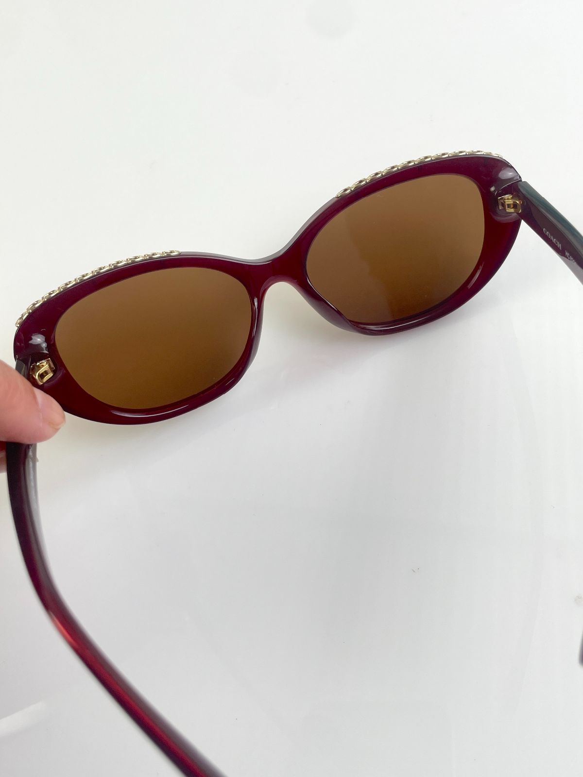 COACH CUSTOM TINT, ROUNDED CAT EYE SUNGLASSES, MONOGRAM C-CHAIN EMBELLISHED TOP BROW - AUBERGINE in MAROON,