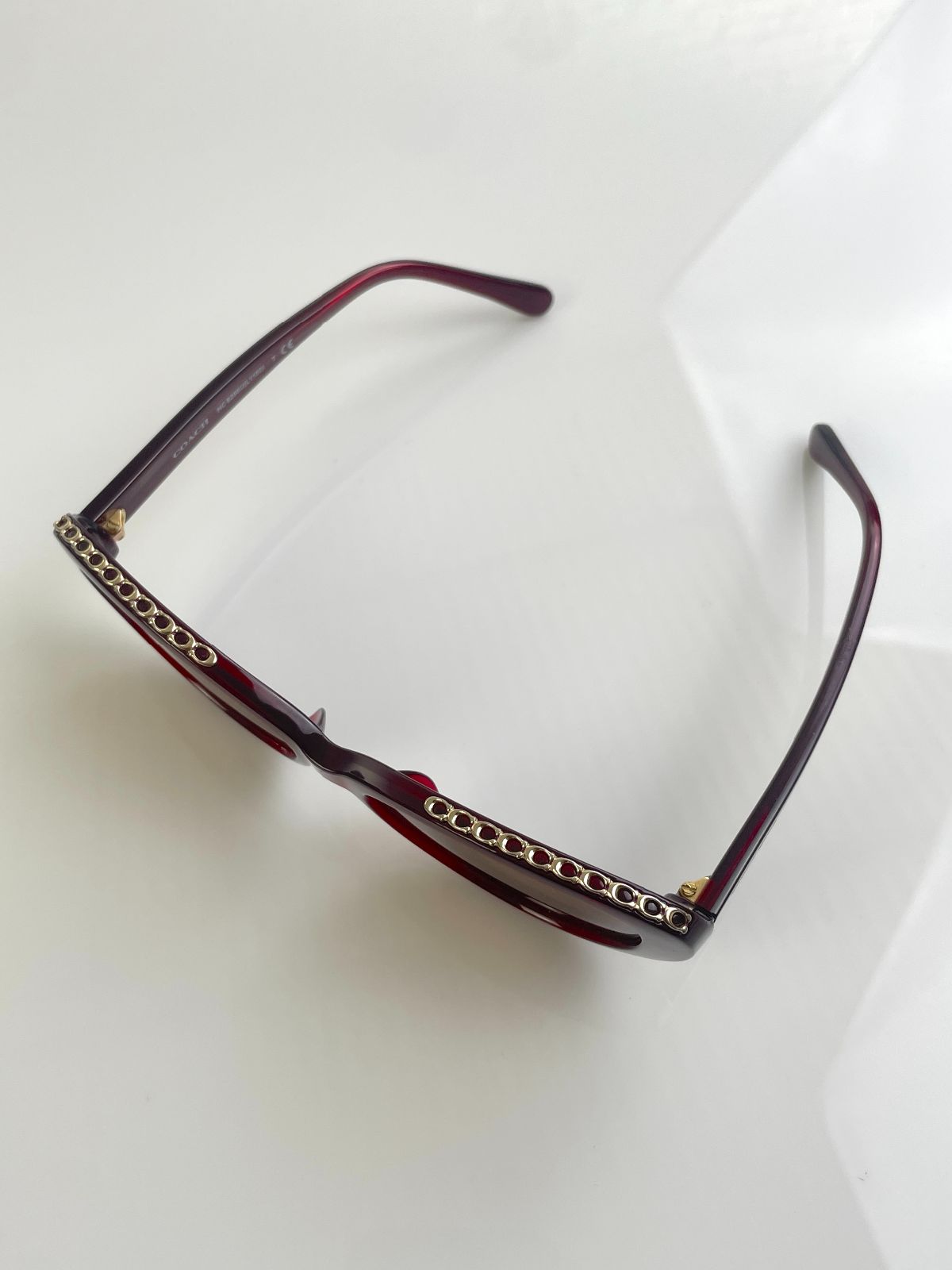 COACH CUSTOM TINT, ROUNDED CAT EYE SUNGLASSES, MONOGRAM C-CHAIN EMBELLISHED TOP BROW - AUBERGINE in MAROON,