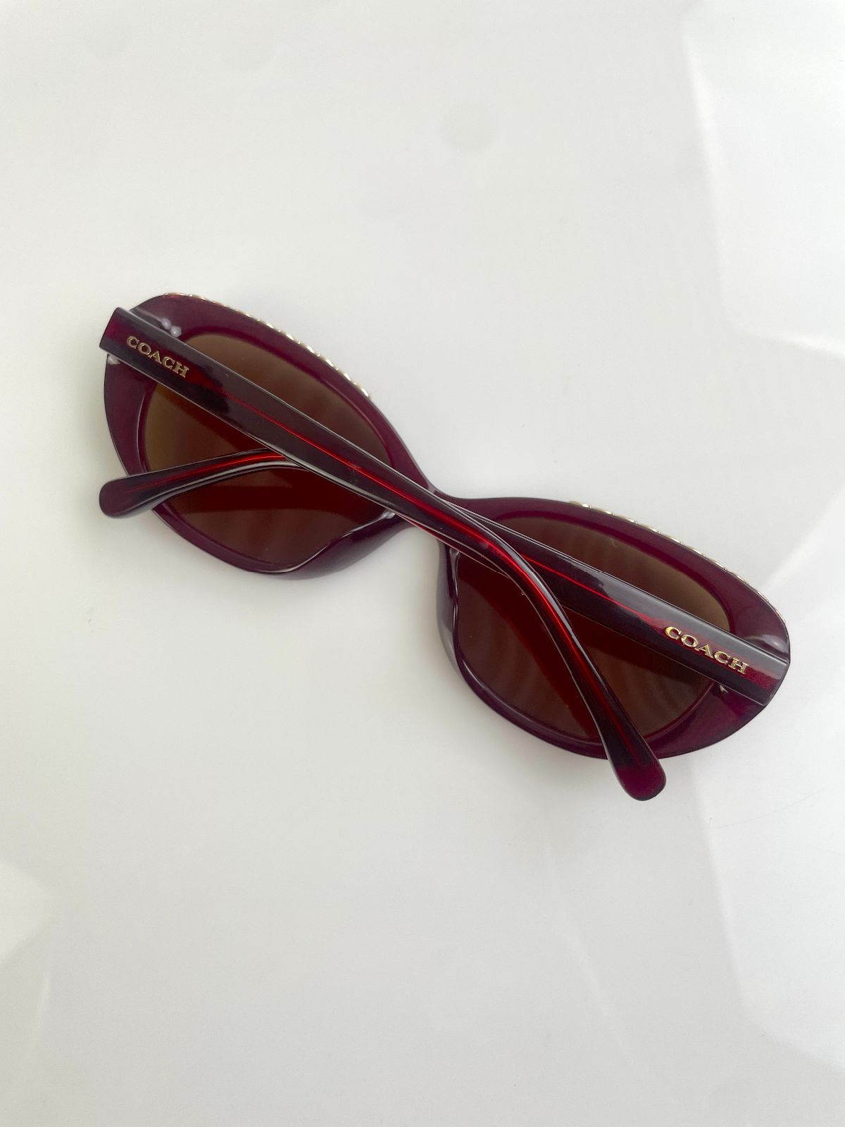 COACH CUSTOM TINT, ROUNDED CAT EYE SUNGLASSES, MONOGRAM C-CHAIN EMBELLISHED TOP BROW - AUBERGINE in MAROON,