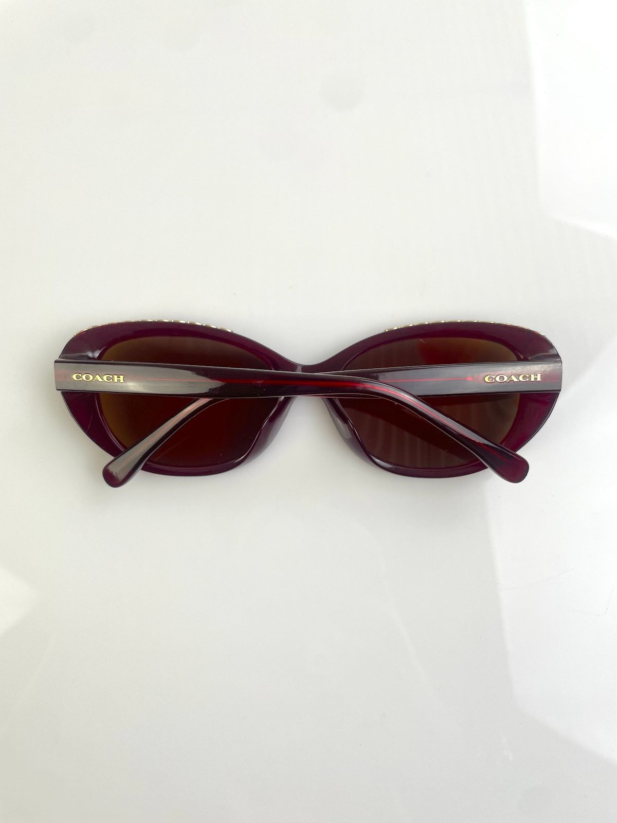COACH CUSTOM TINT, ROUNDED CAT EYE SUNGLASSES, MONOGRAM C-CHAIN EMBELLISHED TOP BROW - AUBERGINE in MAROON,