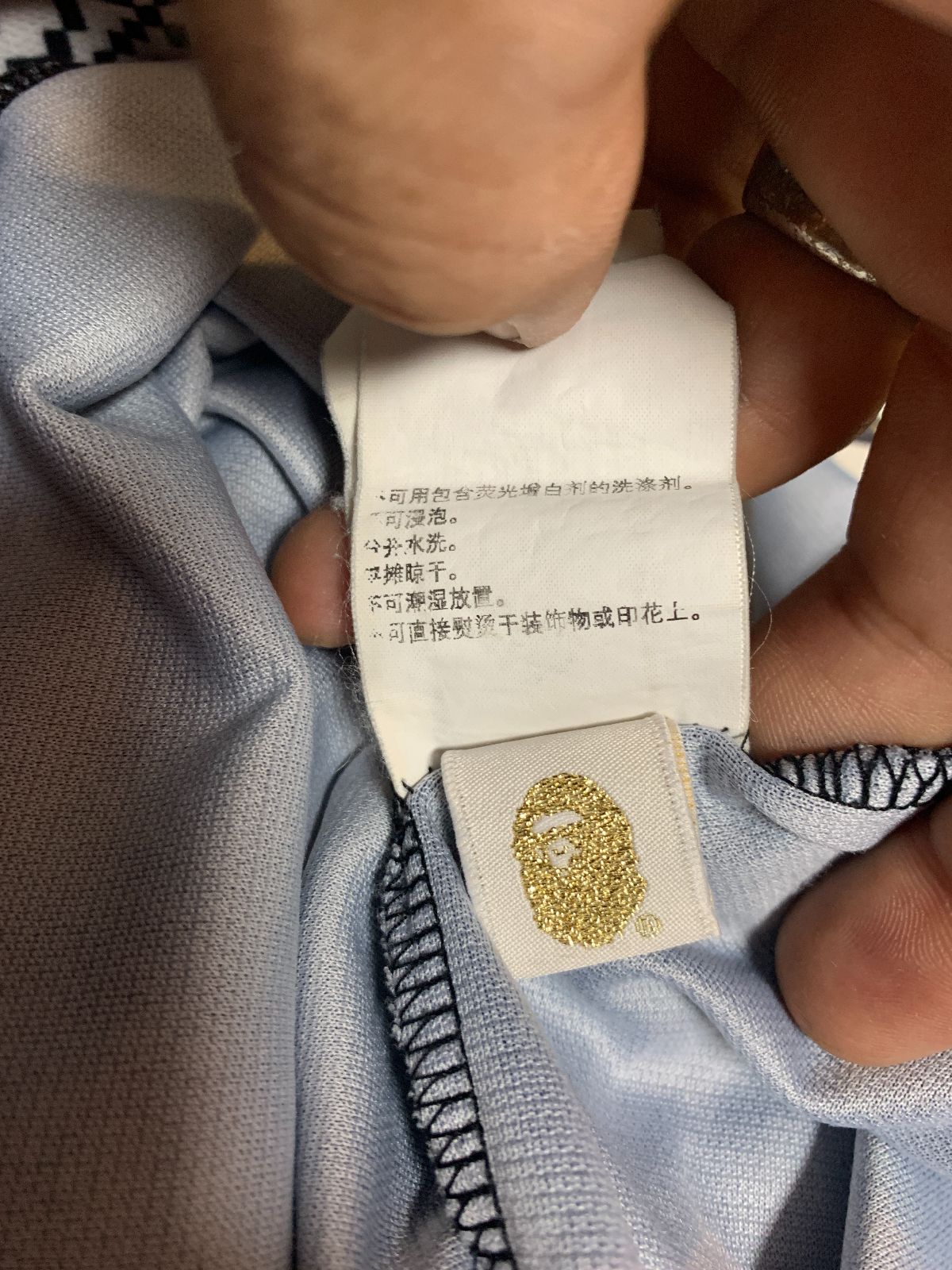 BAPE AS-IS BAPE PIXEL PATTERN ON SLEEVES JERSEY in BLACK