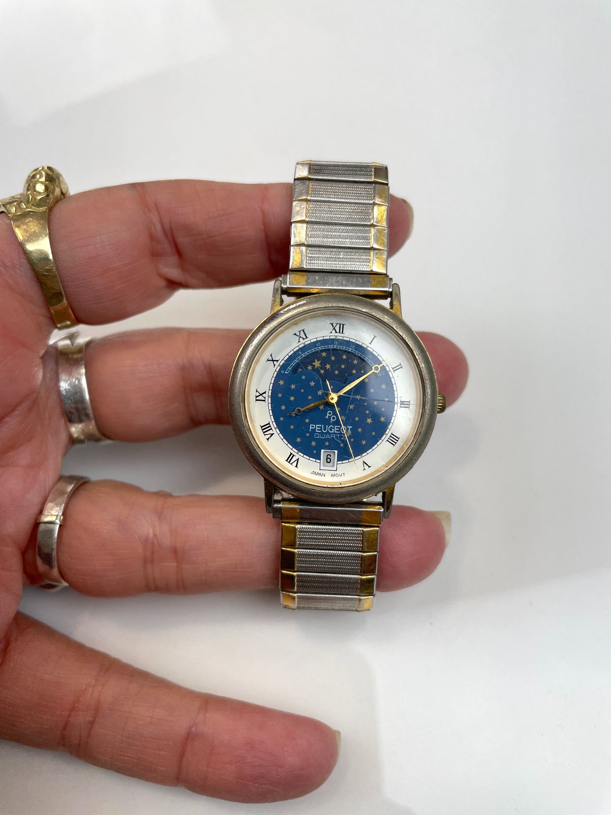 PEUGEOT QUARTZ STAR DIAL TWO-TONE STRETCH BAND WRIST WATCH STAINLESS STEEL in BLUE, SILVER
